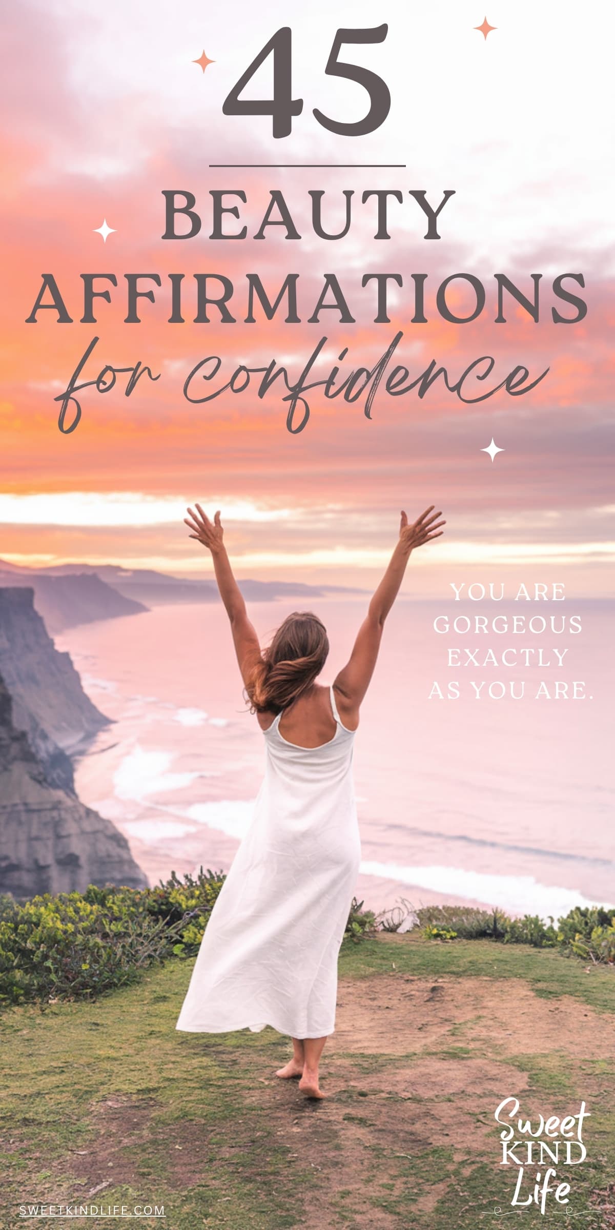 45 beauty affirmations for confidence text overlay on a photo of a woman in a white dress from the back with her arms raised to the sky overlooking cliffs and the ocean at sunset