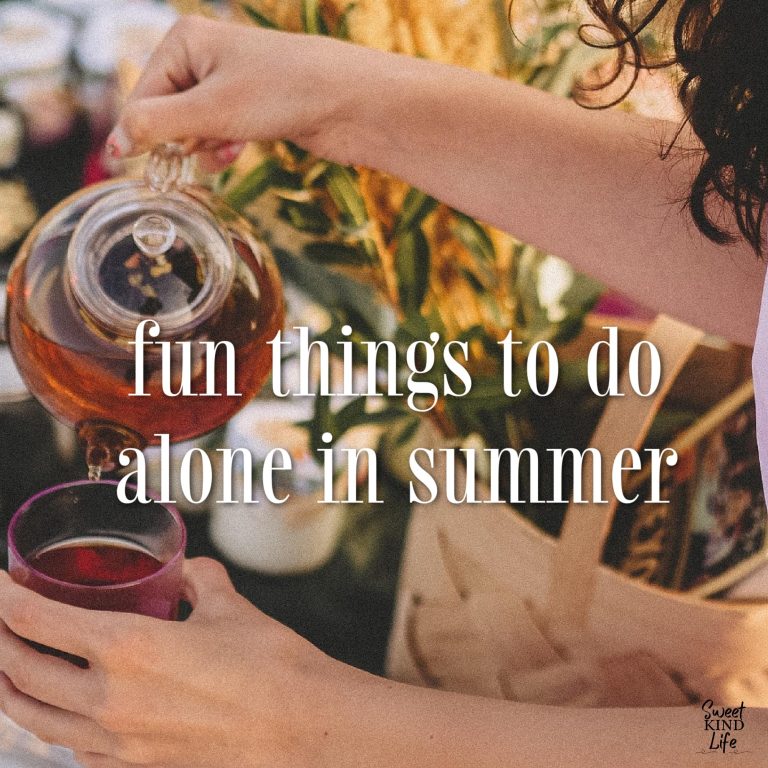 fun things to do alone in summer text overlay over a photo of a woman pouring tea from a glass teapot with a picnic basket and flowers in the background