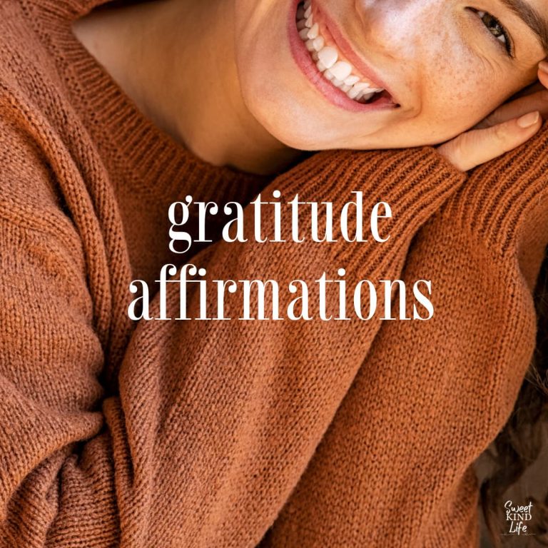 gratitude affirmations text overlay on a photo of a smiling woman in a brown sweater