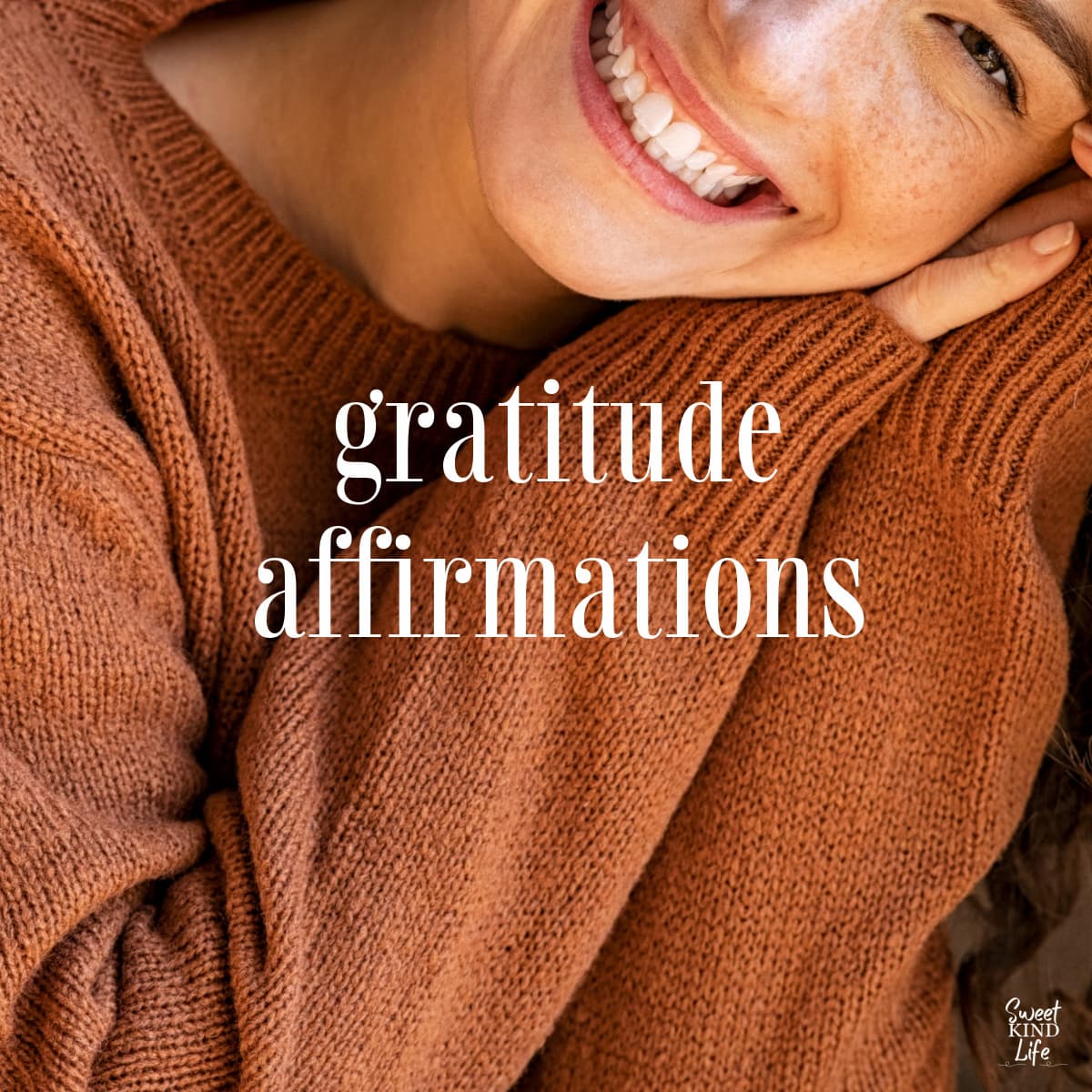 gratitude affirmations text overlay on a photo of a smiling woman in a brown sweater