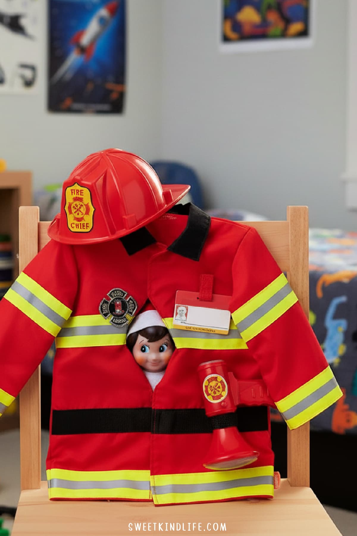 girl elf on the shelf peeking through a fireman kid's costume