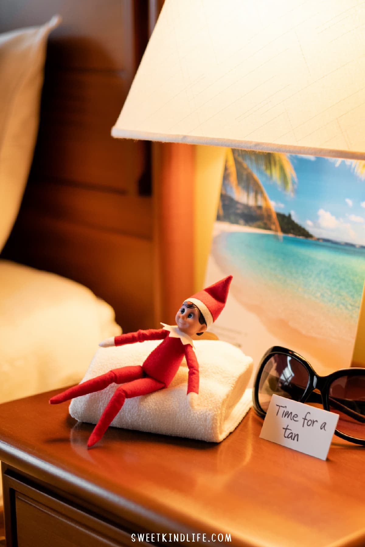 funny elf on the shelf ideas for sunbathing