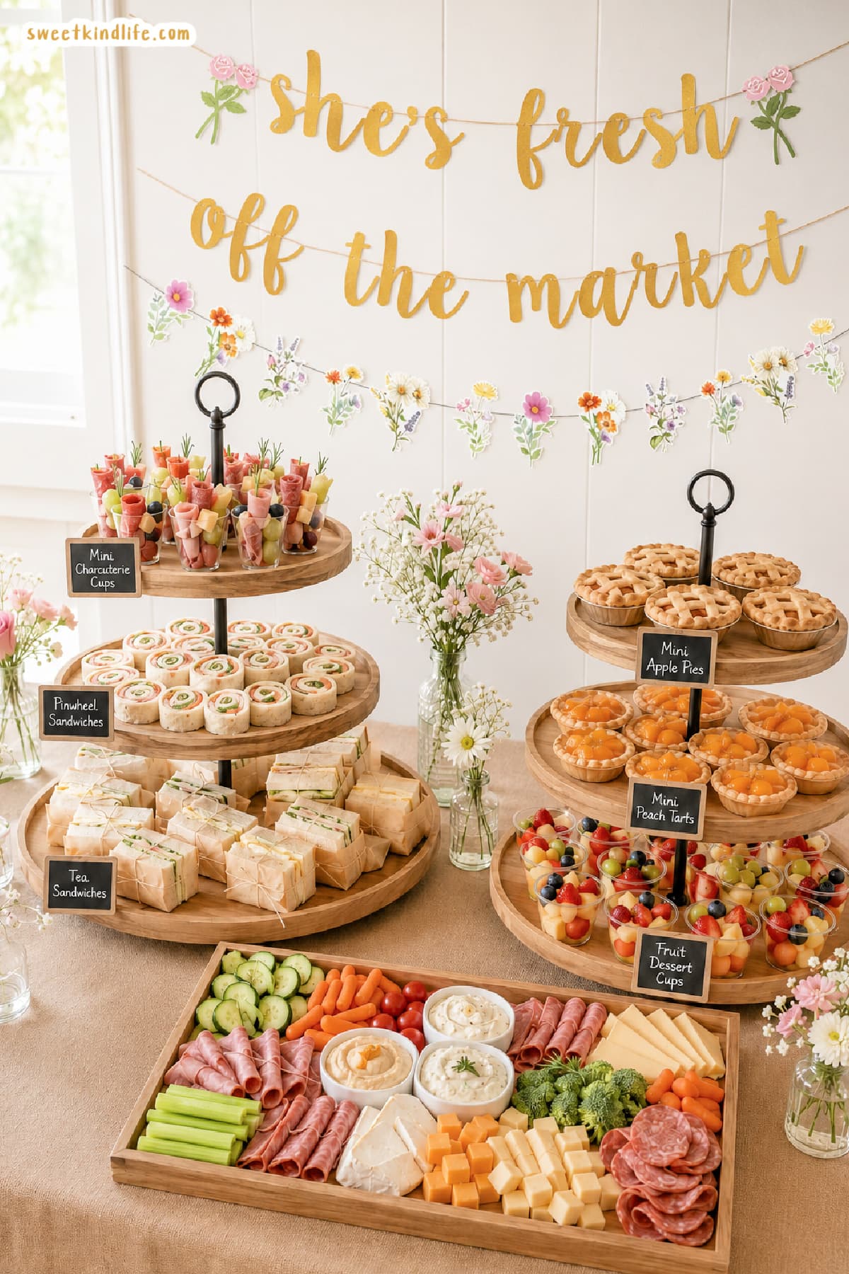 Food spread with chalkboard signs for she's fresh off the market bridal shower theme