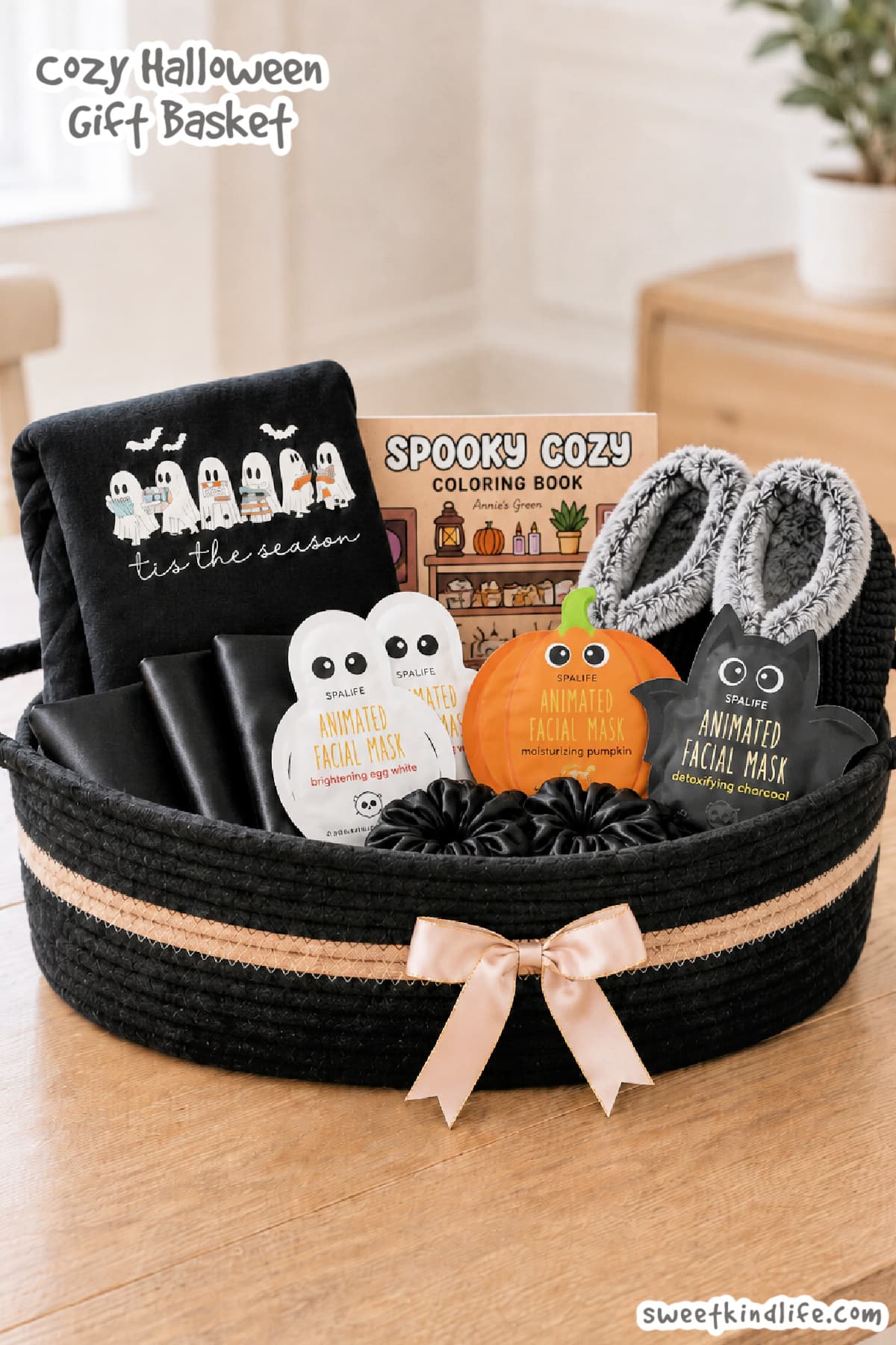 Cozy Halloween Gift Basket with black satin pillowcases, sweatshirt, slippers, scrunchies and more
